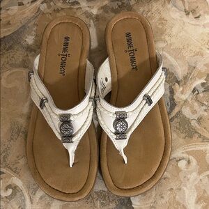 EEUC Minnetonka Size 7 white sandals w/leather uppers and silver embellishments.